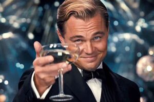 Leonardo DiCaprio holding a glass of champage great gatsby quotes