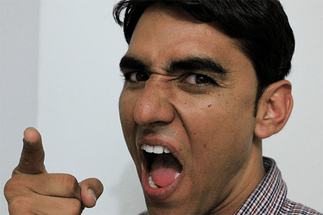 Angry person finger pointing and needs to know anger quotes